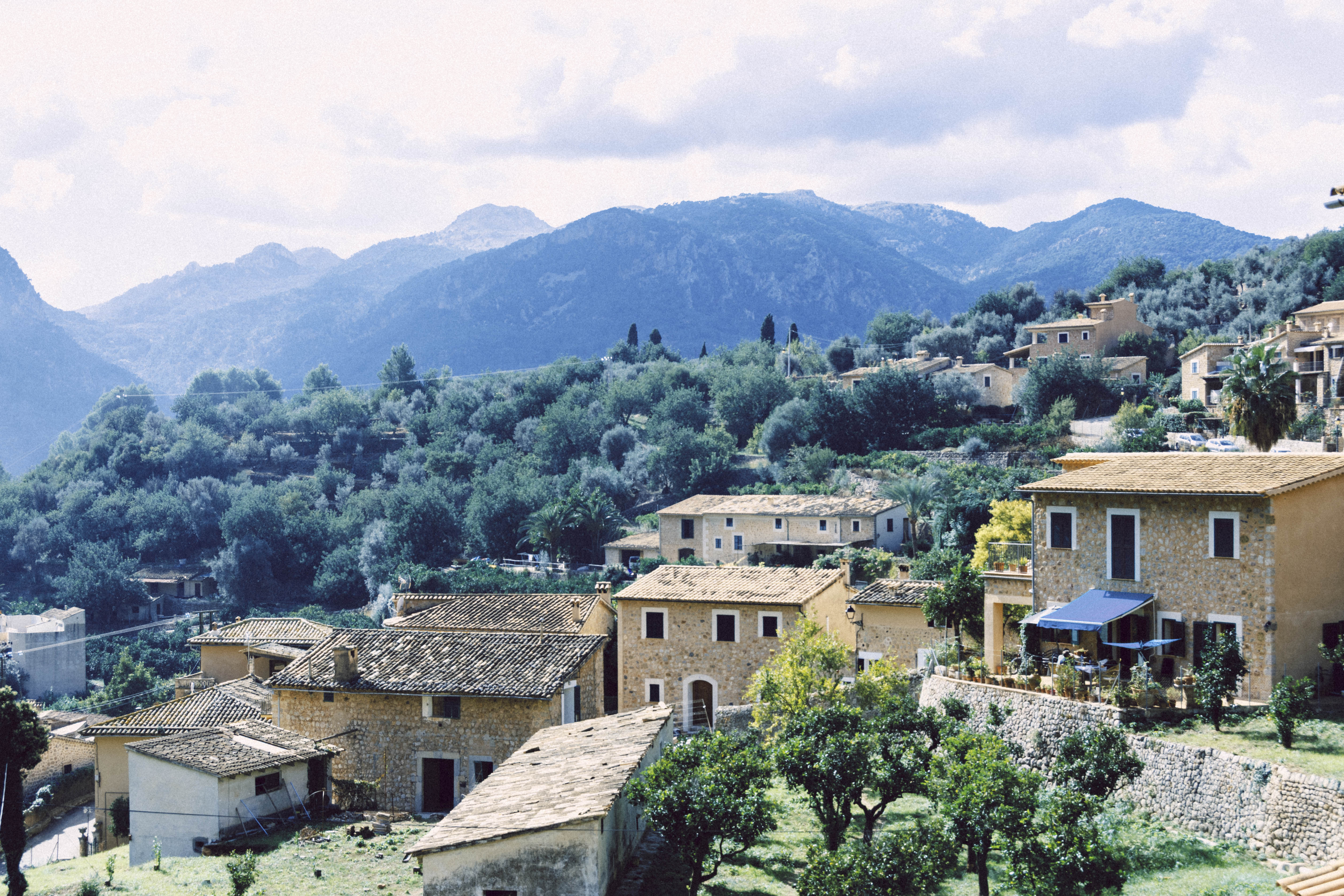 Village Beneath the Mountains